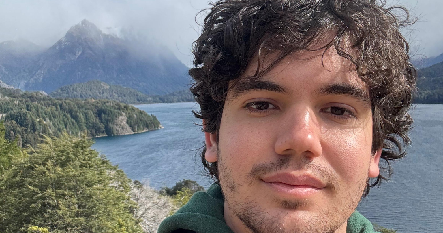 Neto Lócio, co-founder of ChampQuest and SEO strategist, outdoors during travel.