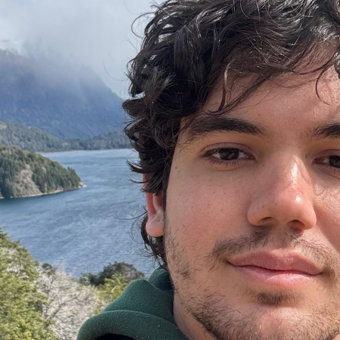 Neto Lócio, co-founder of ChampQuest and SEO strategist, outdoors during travel.